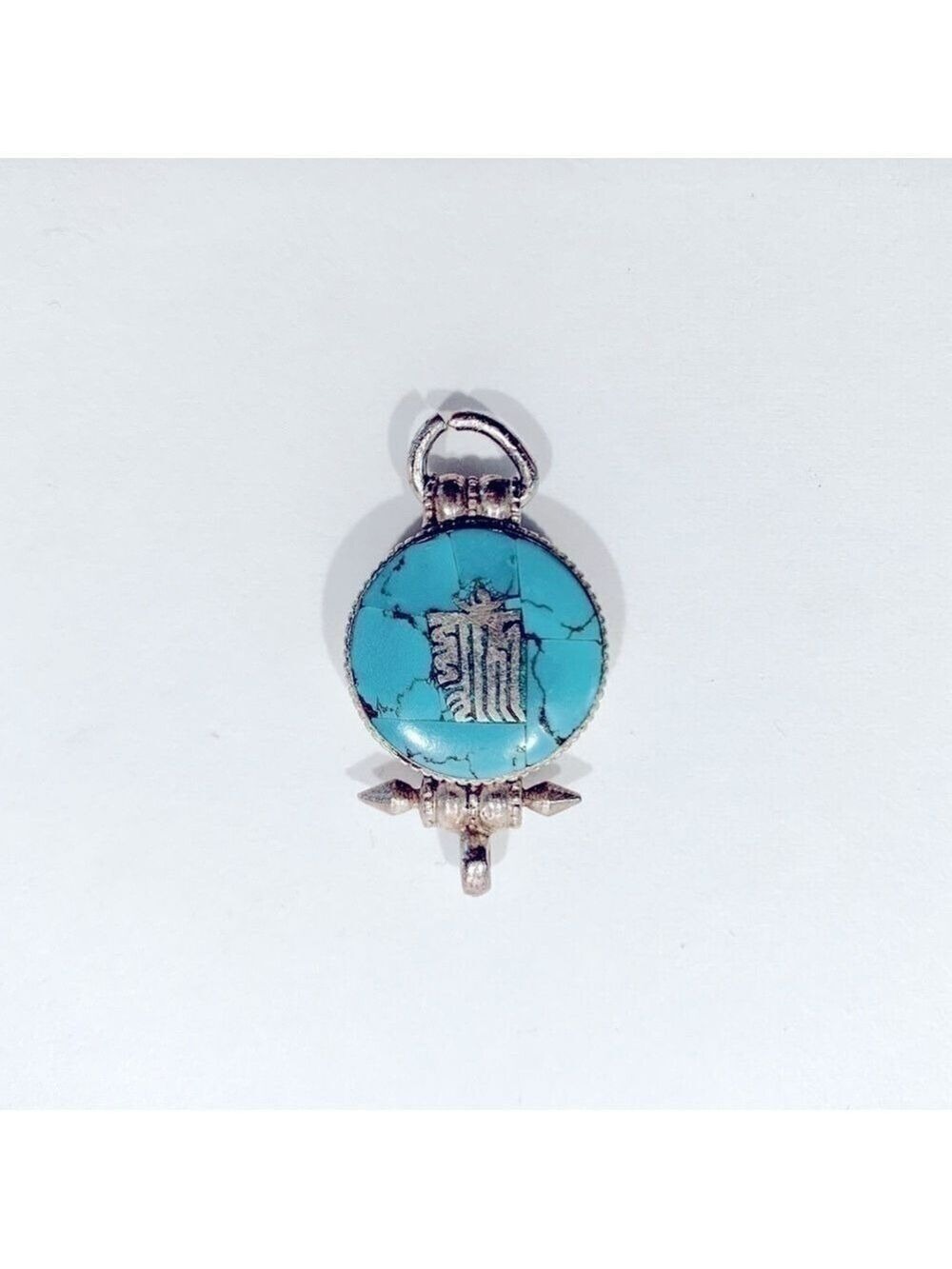 Stamped Silver Pendant With Turquoise Inlay.